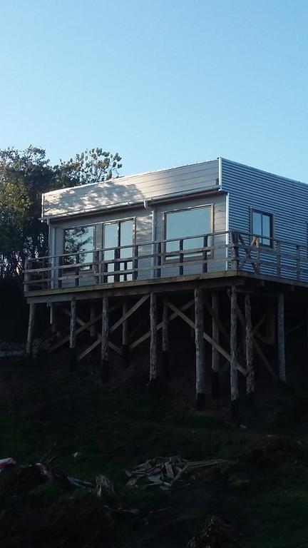 Cabanas Auquinco Chiloe Путемун Номер фото